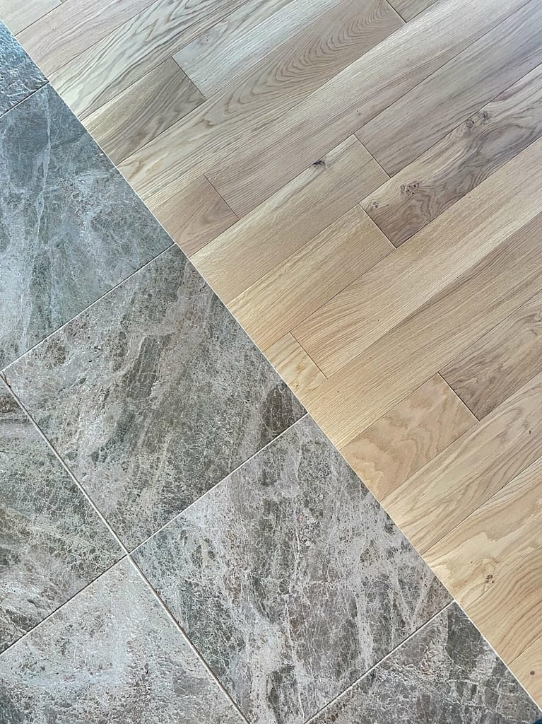 "Luxurious oak parquet and marble flooring in the apartment.