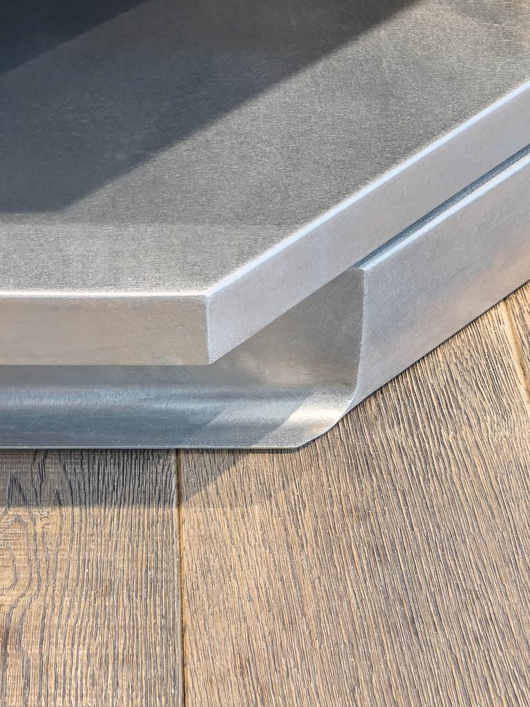 Inox Detail in Cheese Shop Design