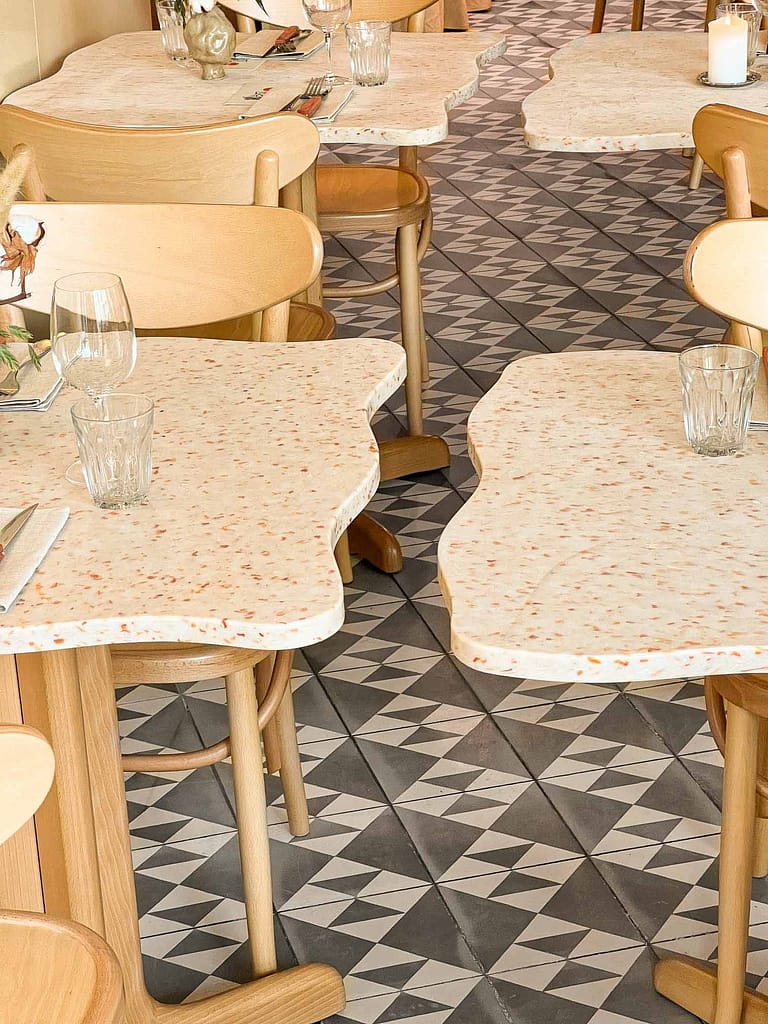 Artistic wave table in HOXAR STUDIO's pizzeria restaurant design.